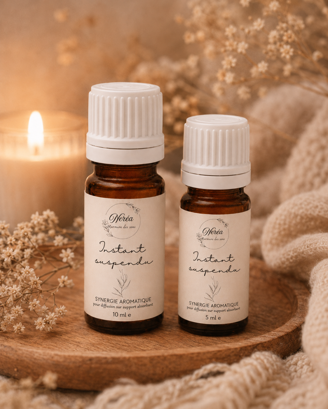 Les deux formats de la synergie d'aromathérapie Instant Suspendu NERÉA, flacons 5 ml et 10 ml en verre ambré, côte à côte